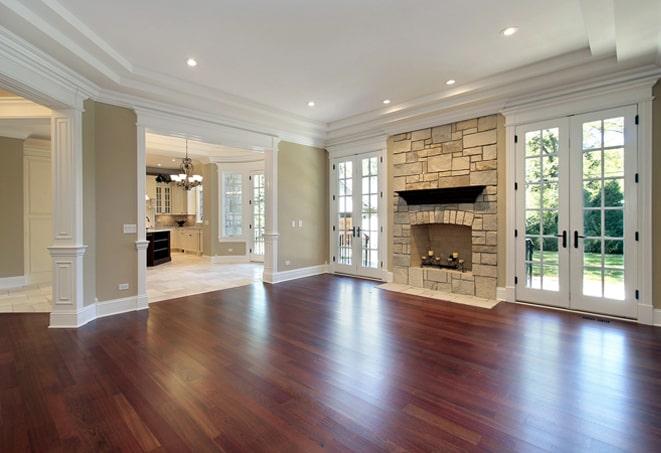 wide plank wood flooring extending through an industrial loft